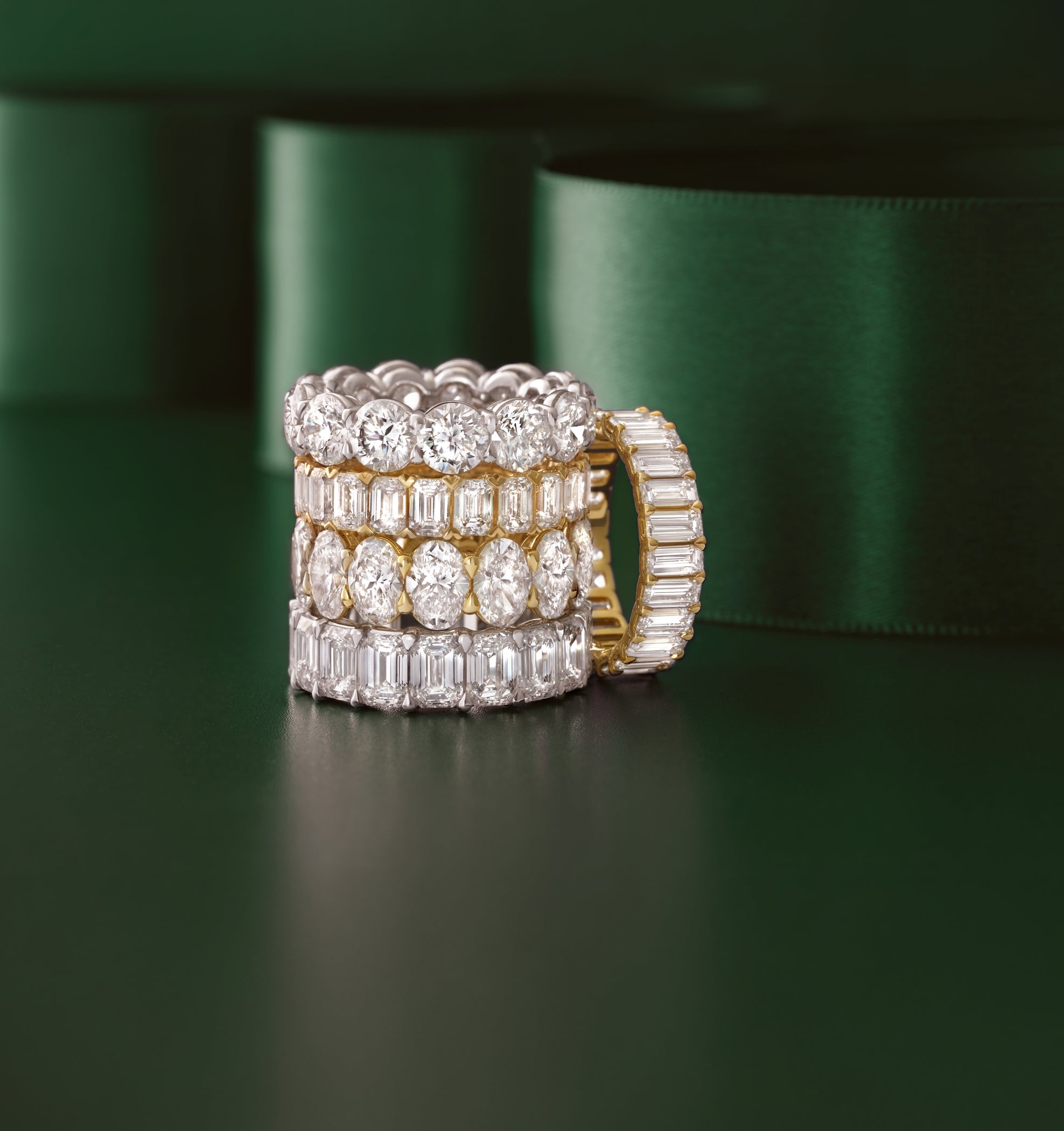 Side view of a 14K yellow gold lab-grown baguette diamond eternity ring showing diamonds around the entire band