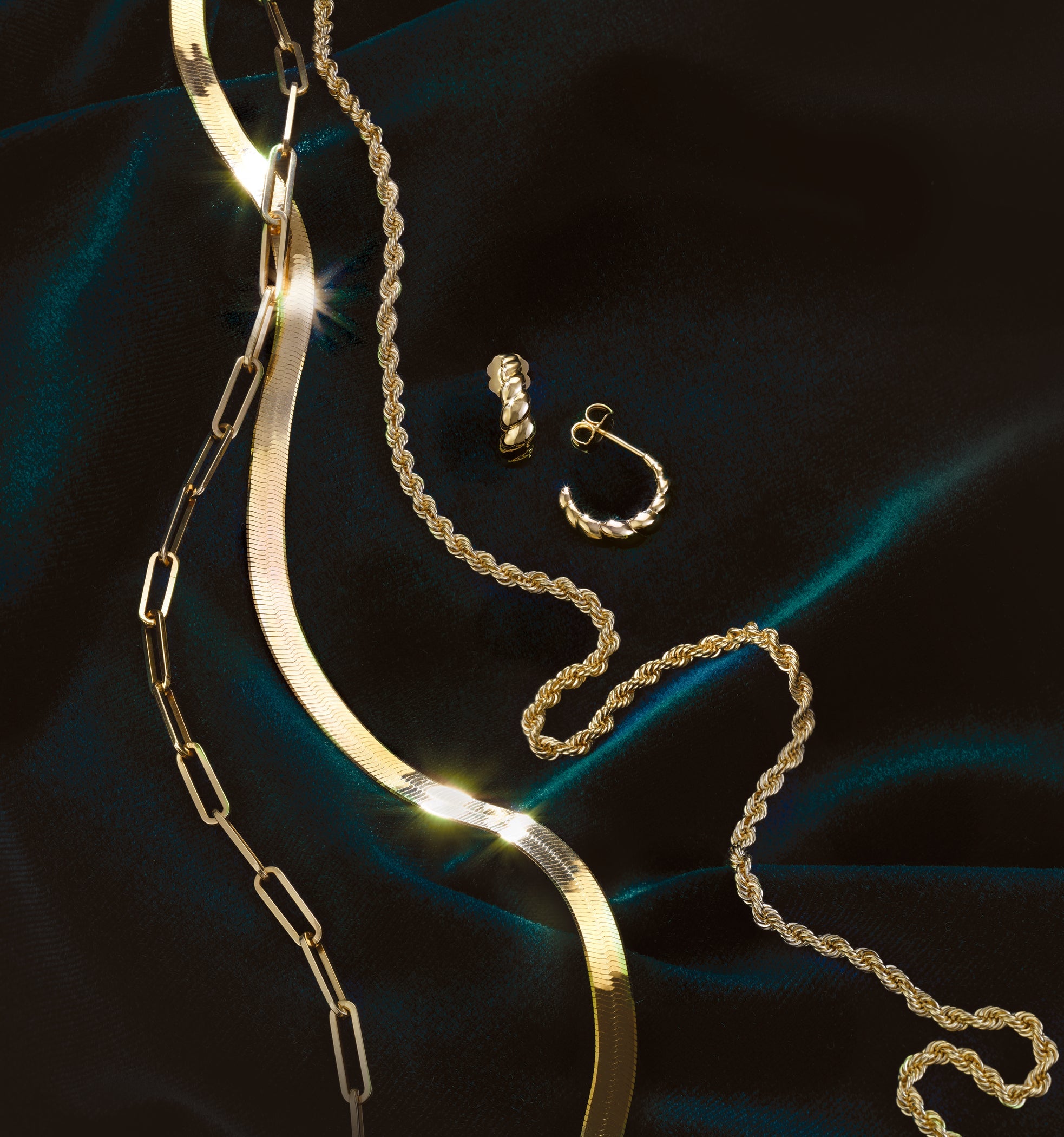 Everyday gold jewelry collection with 14K gold rings, necklaces, bracelets and earrings
