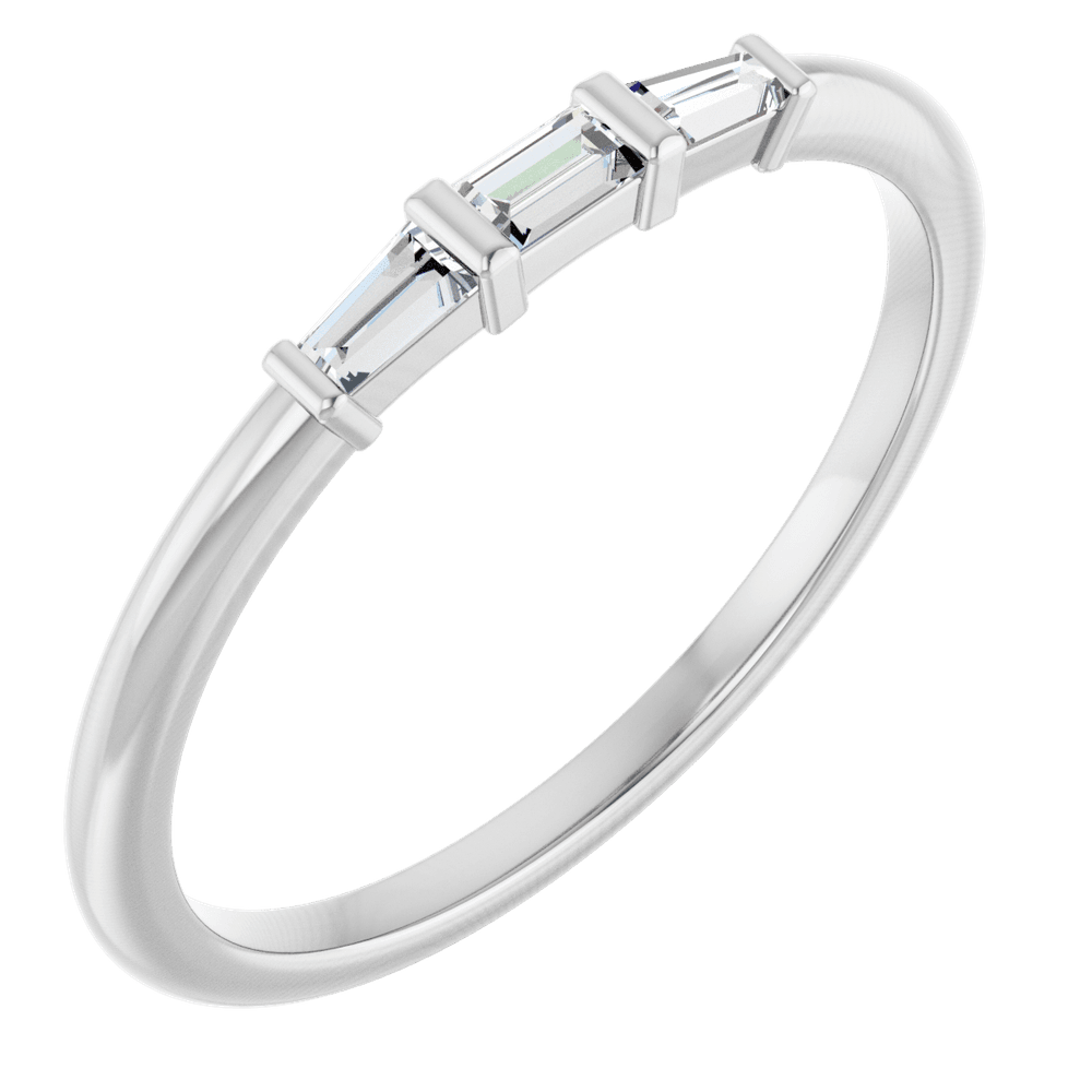 Top view of a 14K yellow gold ring with one straight and two tapered natural baguette diamonds