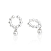 Pair of pearl earrings on a white background
