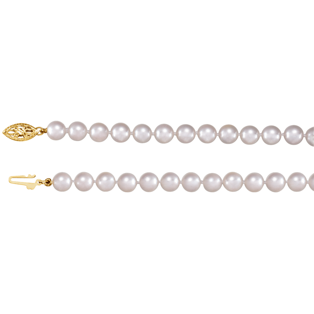 Close-up of 6–6.5mm cultured white Akoya pearls with polished solid 14K yellow gold fish-hook clasp