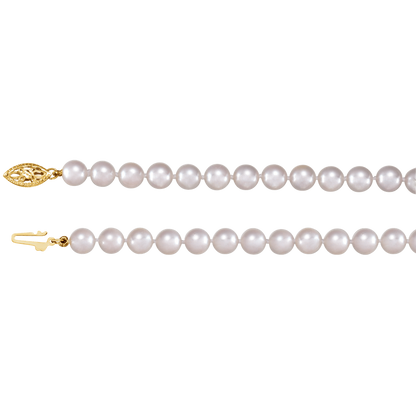 Close-up of 6–6.5mm cultured white Akoya pearls with polished solid 14K yellow gold fish-hook clasp