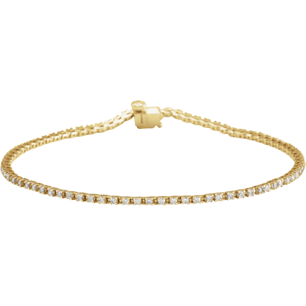 Solid 14K gold diamond tennis bracelet finished with a streamlined box clasp
