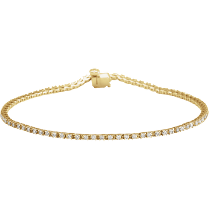 Solid 14K gold diamond tennis bracelet finished with a streamlined box clasp
