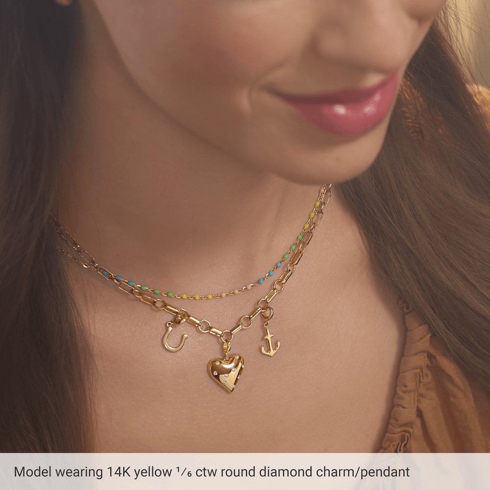 diamond heart pendant, gold heart necklace, 14k gold diamond pendant, natural diamond jewelry, heart charm gold, luxury gold pendant, everyday diamond necklace, timeless jewelry piece, gold charm pendant