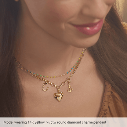 diamond heart pendant, gold heart necklace, 14k gold diamond pendant, natural diamond jewelry, heart charm gold, luxury gold pendant, everyday diamond necklace, timeless jewelry piece, gold charm pendant