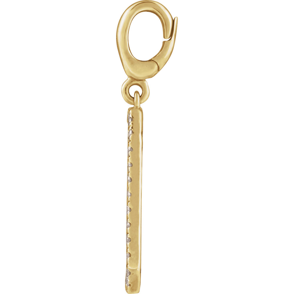 Detail shot of Médaillon 14K yellow gold natural diamond dog tag pendant — polished finish and diamond border