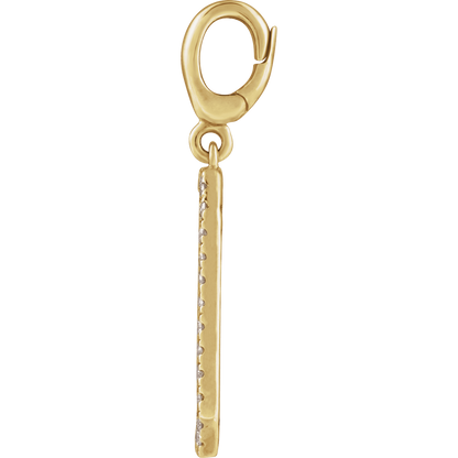 Detail shot of Médaillon 14K yellow gold natural diamond dog tag pendant — polished finish and diamond border