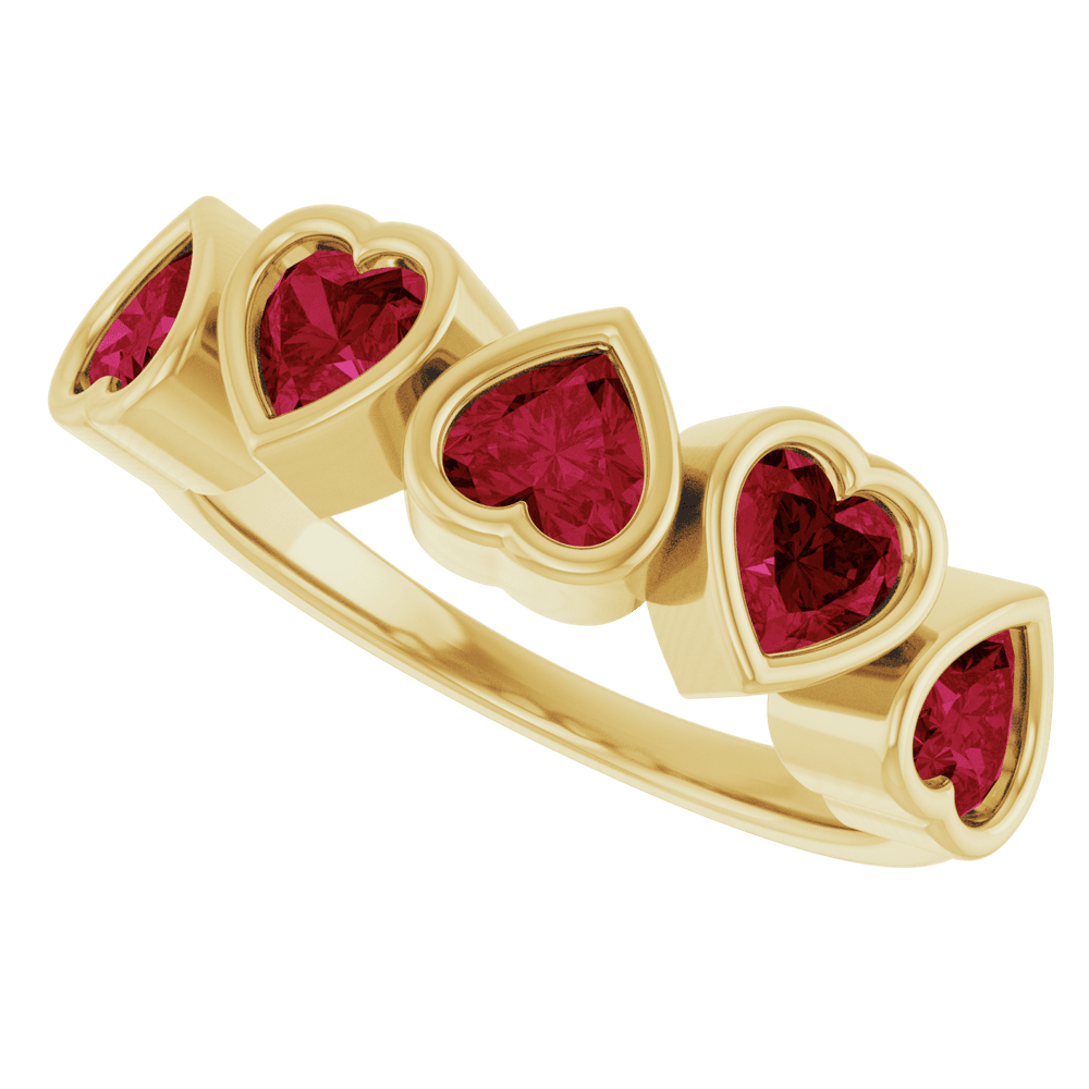 Front view of five 4 × 4 mm AA natural Mozambique garnets bezel set across a polished yellow gold ring