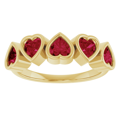 Rear view of the solid closed-back construction on a 14K yellow gold five-stone garnet ring