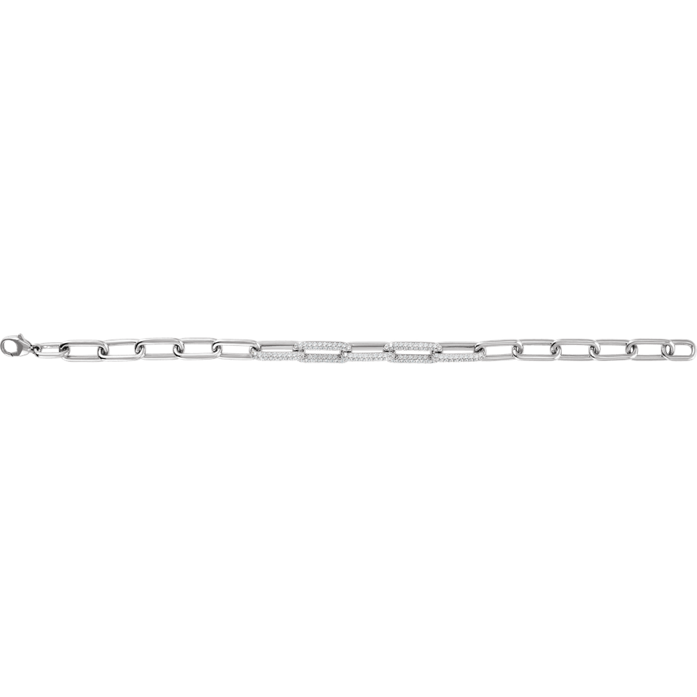 Close-up of F+ VS lab-grown round diamonds set across the links of a 14K gold paperclip bracelet