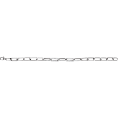 Close-up of F+ VS lab-grown round diamonds set across the links of a 14K gold paperclip bracelet