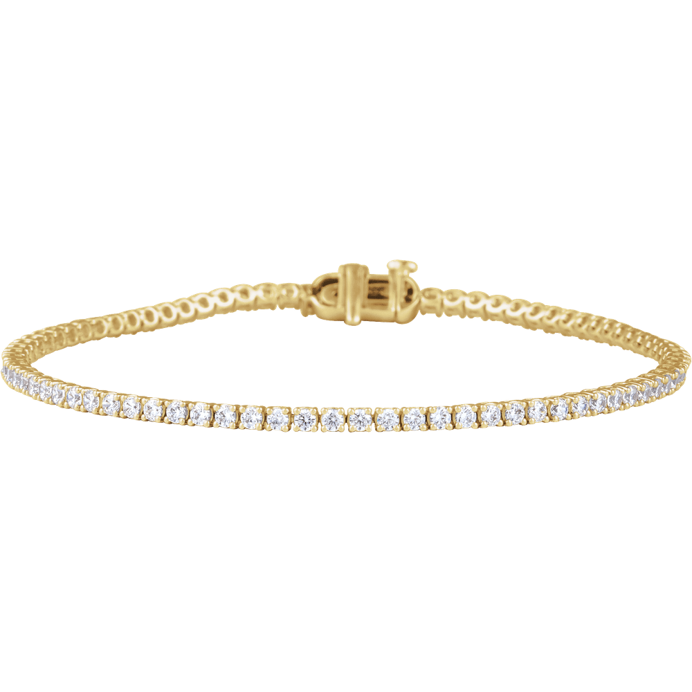 Continuous line of round G-H VS2 lab-grown diamonds set in a polished 14K white gold tennis bracelet