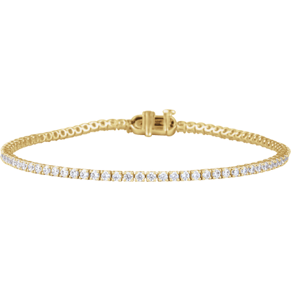 Continuous line of round G-H VS2 lab-grown diamonds set in a polished 14K white gold tennis bracelet