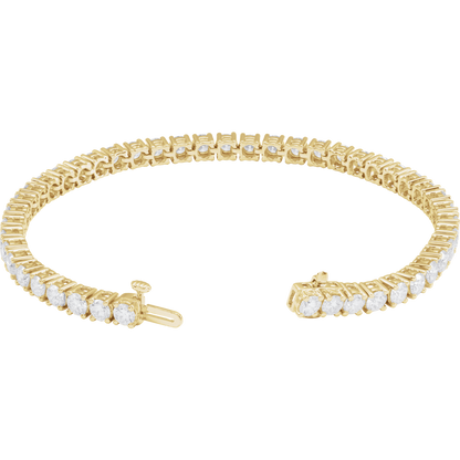 Solid 14K gold tennis bracelet

Lab-grown diamonds with exceptional brilliance

Classic 4-prong setting for security &amp; longevity

Elegant 4 mm width for a balanced luxury look

Secure box clasp for everyday confidence

Designed as a long-term jewelry investment

Ideal for gifting, anniversaries &amp; milestone moments