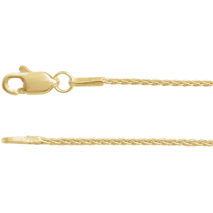 Close-up of Épi Solaire 14K yellow gold wheat chain showing its interwoven links and lobster clasp