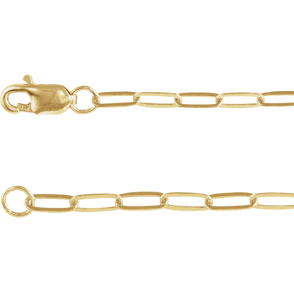 Detailed view of the elongated links on a polished 14K yellow gold-filled paperclip necklace