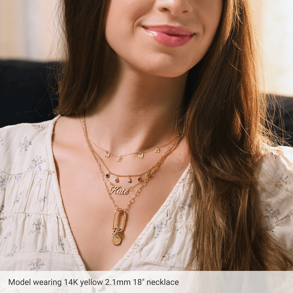 Maillon Serein 2.1 mm gold-filled paperclip necklace styled as part of a layered jewelry look