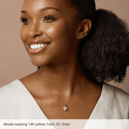 Thin 14K gold-filled cable chain styled with a lightweight pendant
