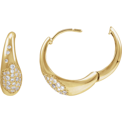 Gold hoop earrings with embedded diamonds on a white background