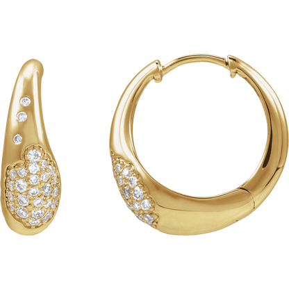 Gold hoop earrings with embedded diamonds on a white background