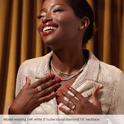 Model wearing Guerilla Choice 14K white gold diamond tennis necklace with layered diamond jewelry